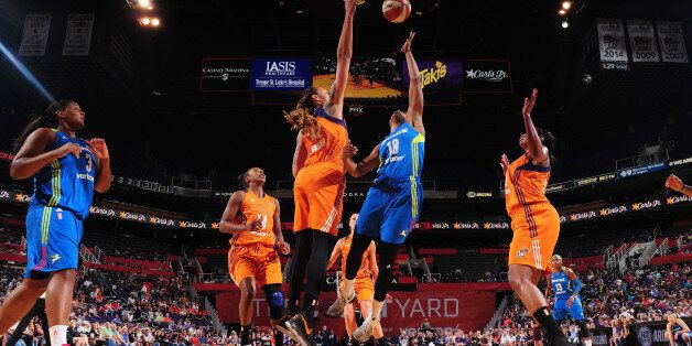 PHOENIX, AZ - MAY 14: Kaela Davis #10 of the Dallas Wings shoots the ball against the Phoenix Mercury on May 14, 2017 at Talking Stick Resort Arena in Phoenix, Arizona. NOTE TO USER: User expressly acknowledges and agrees that, by downloading and or using this Photograph, user is consenting to the terms and conditions of the Getty Images License Agreement. Mandatory Copyright Notice: Copyright 2017 NBAE (Photo by Barry Gossage/NBAE via Getty Images)