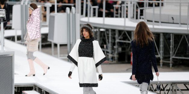 Models present creations by German designer Karl Lagerfeld as part of his Fall/Winter 2017-2018 women's ready-to-wear collection for fashion house Chanel at the Grand Palais during Fashion Week in Paris, France March 7, 2017. REUTERS/Benoit Tessier