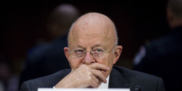 James Clapper, director of National Intelligence, listens to testimony during the Senate Intelligence Committee hearing in Washington, D.C., U.S., on Tuesday, Jan. 10, 2017. CIA, FBI, NSA relied on human, technical and open sources to conclude Russia was responsible for hacking U.S. presidential campaign, Clapper said. Photographer: Pete Marovich/Bloomberg via Getty Images