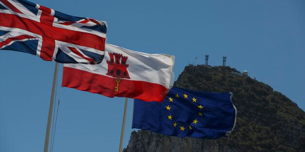 GIBRALTAR - APRIL 04: (L-R) Flags of the United Kingdom, Gibraltar and the European Union are flown while the Gibraltar Rock is seen on the back at the Spain-Gibraltar border on April 4, 2017 in Gibraltar, Gibraltar. Tensions have risen over Brexit negotiations for the Rock of Gibraltar. The European Council has said Gibraltar would be included in a trade deal between London and Brussels only with the agreement of Spain. While former Conservative leader Michael Howard claimed that Theresa May w