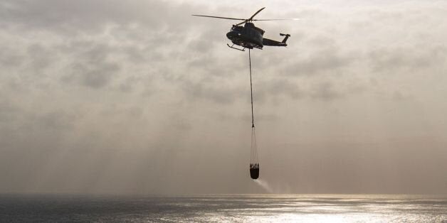 A Griffin HAR2 helicopter from the RAF Akrotiri multi-role 84 Squadron takes part in a fire rescue drill at the Sovereign Base Area (SBA) of Akrotiri, a British overseas territory located ten kilometres west of the Cypriot port city of Limassol, on February 8, 2017. / AFP / Florian CHOBLET (Photo credit should read FLORIAN CHOBLET/AFP/Getty Images)