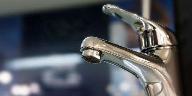 Chrome Bathroom Faucet with blur background