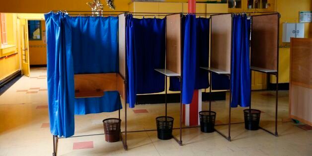 A photo shows voting booths at a polling station in a nursery school in Montreuil, outside Paris, on May 6, 2017, one day before Sunday's presidential election run-off. / AFP PHOTO / GEOFFROY VAN DER HASSELT (Photo credit should read GEOFFROY VAN DER HASSELT/AFP/Getty Images)
