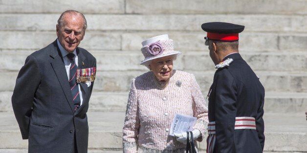 Britain's Queen Elizabeth and Prince Phillip leave St Martin's in the Fields church after attending a service to commemorate the 70th anniversary of VJ Day in London, Britain August 15, 2015. REUTERS/Neil Hall