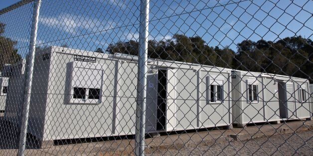 A picture shows prefabricated houses in a registration centre for migrants and refugees on the Greek island of Leros on February 16, 2016.Greece on February 16 hit back at EU criticism of its handling of the massive migrant influx, saying the time for blaming Athens was 'over' as it prepared to open new centres to register refugees, including four on frontline islands. / AFP / ILIANA MIER (Photo credit should read ILIANA MIER/AFP/Getty Images)