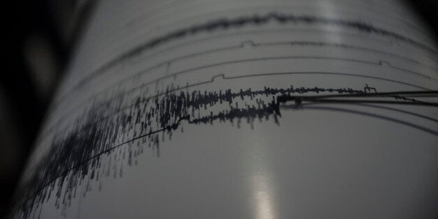 KARO, INDONESIA - AUGUST 25: The geology staff monitors the activity of volcano on the seismograph as Sinabung volcano comes back to eruption on August 25, 2016 in Karo, Indonesia. PHOTOGRAPH BY Sutanta Aditya / Barcroft ImagesLondon-T:+44 207 033 1031 E:hello@barcroftmedia.com -New York-T:+1 212 796 2458 E:hello@barcroftusa.com -New Delhi-T:+91 11 4053 2429 E:hello@barcroftindia.com www.barcroftimages.com (Photo credit should read Sutanta Aditya / Barcroft Images / Barcroft Media via Getty Images)