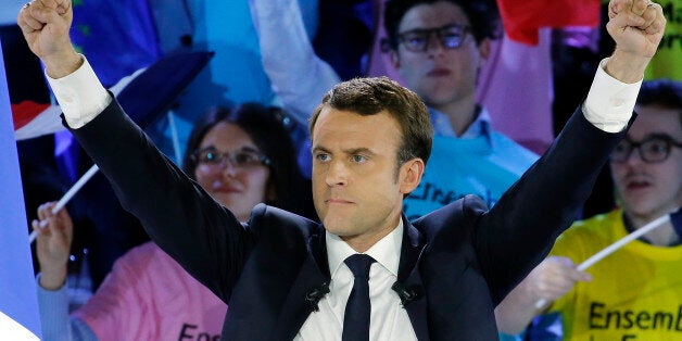 PARIS, FRANCE - MAY 01: President of the political movement 'En Marche !' ( Onwards !) and French presidential election candidate Emmanuel Macron waves during a campaign rally on May 01, 2017 in Paris, France. Marine le Pen faces Emmanuel Macron in the final round of the French presidential elections on May 07. (Photo by Chesnot/Getty Images)