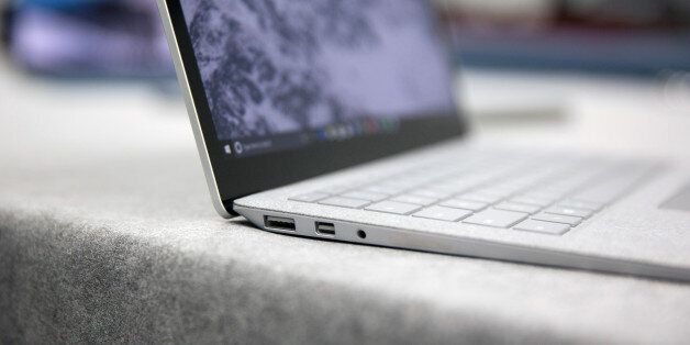 A new Surface Laptop computer is displayed at the hardware lab of the Microsoft Corp. main campus in Redmond, Washington, U.S., on Thursday, April 20, 2017. Microsoft Corp., a company once derided for buggy software, unstable hardware and indifferent design, debuted the Surface Laptop on Tuesday. WeighingÂ in at 2.76 pounds, about a quarter-pound less than Apple's MacBook Air, the Surface Laptop boasts a 13.5-inch screenÂ and is one of the thinnest and lightest products in its class. Photographer: Mike Kane/Bloomberg via Getty Images