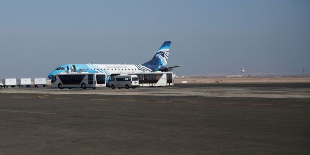 Workers service an EgyptAir flight in the airport of Red Sea resort of Sharm el-Sheikh, south of Cairo, Egypt October 30, 2016. REUTERS/Amr Abdallah Dalsh