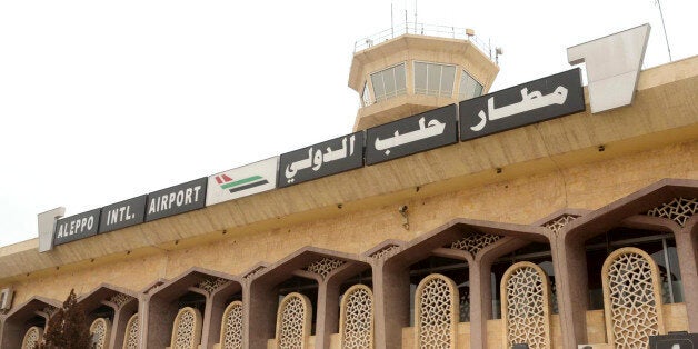 A view shows a part of Aleppo international airport January 22, 2014. Syria hailed the reopening of Aleppo international airport on Wednesday after a year's closure as a military victory over rebels, on the opening day of peace talks in Switzerland aimed at ending the civil war there. Syrian state television reported that a passenger flight carrying a media delegation from Damascus, 300 km (200 miles) to the south, landed at 10:30 a.m. (8:30 a.m. GMT) in Aleppo, formerly Syria's commercial hub and its most populous city. A reporter for the government outlet said the flight was made possible by the army's control of the entire area around the airport, which he said had been achieved over the past week. REUTERS/George Ourfalian (SYRIA - Tags: POLITICS CIVIL UNREST CONFLICT)