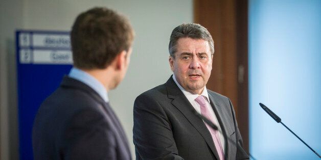 BERLIN, GERMANY - MARCH 16: German Foreign Minister and Vice Chancellor Sigmar Gabriel (R) speaks to the media during the visit of Emmanuel Macron (L) on March 16, 2017 in Berlin, Germany. Macron is the candidate for the french presidential election this year of the party En Marche!. (Photo by Florian Gaertner/Photothek via Getty Images)