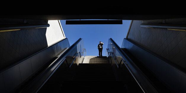 A woman stands at the top of the stairs looking down at the entrance of a closed metro station in Athens on February 2, 2016.Labor unions across the country have called for a nationwide strike on February 4, against the reforms, which Greece's international creditors, including the International Monetary Fund (IMF) and European institutions, said must be approved in order to unlock further aid. / AFP / ARIS MESSINIS (Photo credit should read ARIS MESSINIS/AFP/Getty Images)
