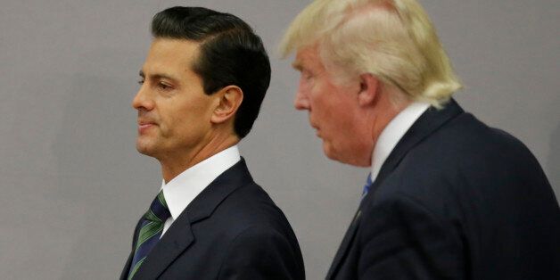 U.S. Republican presidential nominee Donald Trump and Mexico's President Enrique Pena Nieto walk out after finishing a press conference at the Los Pinos residence in Mexico City, Mexico, August 31, 2016. REUTERS/Henry Romero