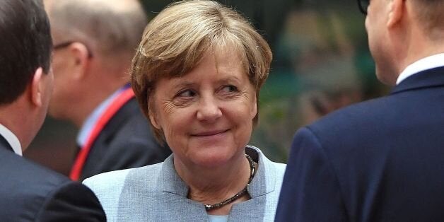 German Chancellor Angela Merkel (C) speaks with Swedish Prime Minister Stefan Loefven (L), and Finnish Prime Minister Juha Sipila (R) during a special EU leaders' meeting at the Europa building, the main headquarters of European Council and the Council of the EU, in Brussels, on April 29, 2017.The 27 ?EU leaders hold a summit to adopt Brexit negotiating guidelines. EU President Donald Tusk urged the bloc to keep a united front at a special Brexit summit in Brussels, saying it will also help Britain if they can reach a deal. / AFP PHOTO / EMMANUEL DUNAND (Photo credit should read EMMANUEL DUNAND/AFP/Getty Images)