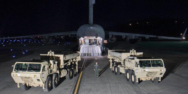 Photo provided by U.S. Forces Korea, a truck carrying parts of U.S. missile launchers and other equipment needed to set up the Terminal High Altitude Area Defense (THAAD) missile defense system arrive at the Osan base, South Korea. The U.S. military has begun moving equipment for the controversial missile defense system to ally South Korea. The announcement Tuesday by the U.S. military comes a day after North Korea test-launched four ballistic missiles into the ocean near Japan.