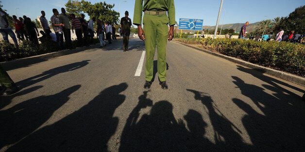 SANTIAGO DE CUBA, CUBA - DECEMBER 04: Interior Ministry troops guard the road leading to the Cementerio Santa Ifigenia where the remains of former Cuban President Fidel Castro were entombed December 4, 2016 in Santiago de Cuba, Cuba. Sunday marked the last of a nine-day mourning period after Castro died November 25 at the age of 90. (Photo by Chip Somodevilla/Getty Images)