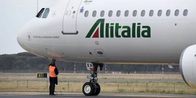 The Alitalia plane transporting Pope Francis for a two-days visit in Egypt prepares to take-off on April 28, 2017 at Rome's Fiumicino airport. / AFP PHOTO / Tiziana FABI (Photo credit should read TIZIANA FABI/AFP/Getty Images)