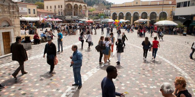 ATHENS, GREECE - APRIL 7: People enjoy Monastiraki Square in the heart of downtown, on April 7, 2016 in Athens, Greece. This spring, the streets are filled with tourists. As it recovers from the financial crisis, Athens is experiencing a cultural rebirth. (Photo by Melanie Stetson Freeman/The Christian Science Monitor via Getty Images)