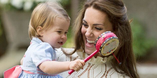 The Duchess of Cambridge holds Princess Charlotte during a children's party in Victoria, British Columbia, Canada September 29, 2016. REUTERS/Jonathan Hayward/Pool