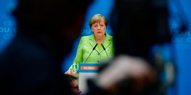 German Chancellor Angela Merkel gives a press conference in Berlin on May 8, 2017, one day after regional elections in the northern state of Schleswig-Holstein.Merkel's conservatives secured a strong win in state polls in northern Germany, giving a boost to her bid to retain power in national elections in September. / AFP PHOTO / John MACDOUGALL (Photo credit should read JOHN MACDOUGALL/AFP/Getty Images)