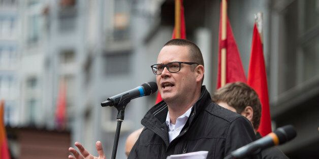 PVDA - PTB spokesman Raoul Hedebouw delivers a speech during a May Day rally in Liege, on May 1, 2017. / AFP PHOTO / Belga / NICOLAS LAMBERT / Belgium OUT (Photo credit should read NICOLAS LAMBERT/AFP/Getty Images)