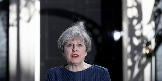 Britain's Prime Minister Theresa May speaks to the media outside 10 Downing Street, in central London, Britain April 18, 2017. British Prime Minister Theresa May called on Tuesday for an early election on June 8, saying the government had the right plan for negotiating the terms of Britain's exit from the European Union and she needed political unity in London. REUTERS/Stefan Wermuth