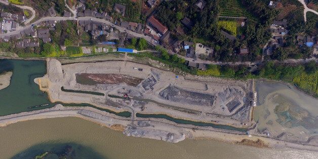 MEISHAN, CHINA - MARCH 20: Aerial view of the archeological site where over 10,000 cultural relics are discovered at Jiangkou Town in Pengshan District on March 20, 2017 in Meishan, Sichuan Province of China. The underwater archeology started on January and has made significant progress in March. Zhang Xianzhong was a leader of a peasant revolt from Yan'an in Shaanxi Province and he later conquered Sichuan in the 17th century. His rule in Sichuan was brief and he was killed by the invading Qing