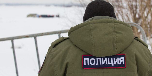 Russian police - emblem on the back OMON, close up at winter day
