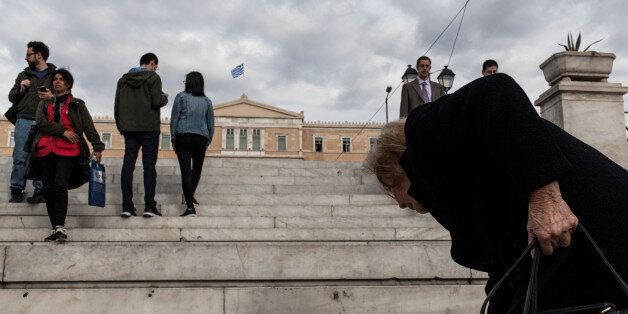 People in Athens, Greece, on April 4, 2017. The main topics of negotiations on reforms needed from Greece to close deal with its creditors, is pensions cutting and others having to do with wages and salaries. Greek Prime Minister, Alexis Tsipras, said on April 2 that "significant steps" would be needed on reducing his country's debt in order for Athens to finalize a long-delayed deal with its international creditors. (Photo by Kostis Ntantamis/NurPhoto via Getty Images)