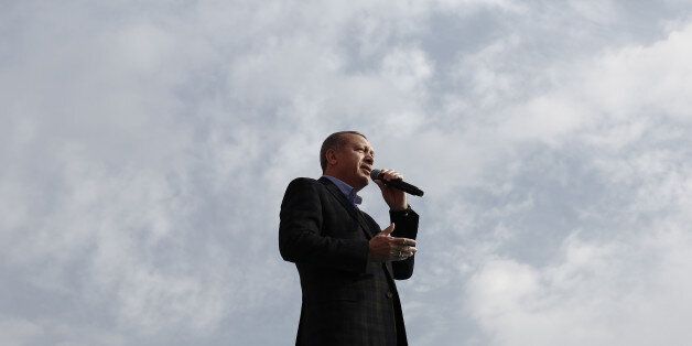 Recep Tayyip Erdogan, Turkey's president, speaks during a 'Yes' referendum campaign rally in Yenikapi square, Istanbul, Turkey, on Saturday, April 8, 2017. With two weeks to go before a referendum that could remodel Turkey's political landscape, the central bank has pushed interest rates to the upper reaches of its monetary framework and depleted its policy tool of choice: flexibility. Photographer: Kostas Tsironis/Bloomberg via Getty Images