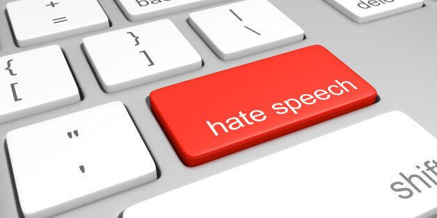 3D render of a computer keyboard with one key labeled for hate speech, representing discriminatory messages that plague online message boards and comment areas.