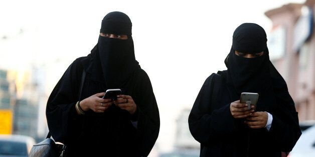 Saudi women use the Careem app on their mobile phones in Riyadh, Saudi Arabia, January 2, 2017. Picture taken January 2, 2017. REUTERS/Faisal Al Nasser