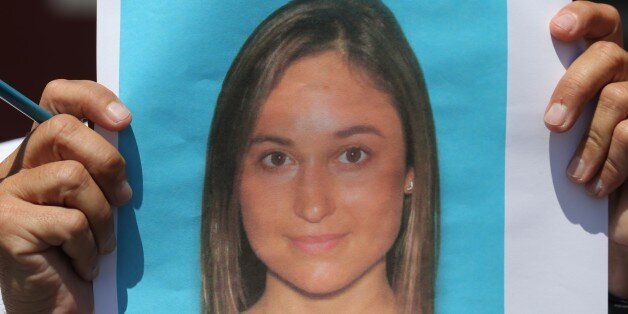 PRINCETON, MA - AUGUST 8: A photo of victim Vanessa Marcotte was shown to the press in Princeton, Mass., Aug. 8, 2016. Marcotte, a 27-year-old New York City woman, was killed Sunday while jogging alone on a wooded road about a half-mile from her mothers home. A State Police K-9 unit found the body of Vanessa Marcotte, 27, a 2011 Boston University graduate who grew up in Leominster and worked at Google, in the woods off Brooks Station Road at 8:20 p.m., several hours after her family reported that she had gone missing. (Photo by David L. Ryan/The Boston Globe via Getty Images)