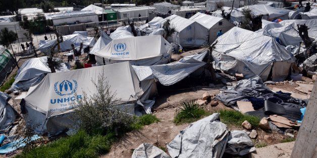 A picture taken on March 16, 2017 shows the Moria migrant camp on the island of Lesbos, almost a year after an EU-Turkey deal. The deal, signed on March 18, 2016, has sought to stem the flow of migrants from Turkey to the EU, in particular Greece, by land and sea routes.Some 3000 refugees and migrnts live in the Moria camp , out of some 14000 stucked on the Aegean islands since the closing of the borderss and the implementation of the deal. / AFP PHOTO / LOUISA GOULIAMAKI (Photo credit should read LOUISA GOULIAMAKI/AFP/Getty Images)