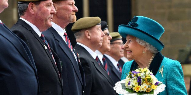 Britain's Queen Elizabeth meets former servicemen following the Royal Maundy service at Leicester Cathedral, April 13, 2017. REUTERS/Anthony Devlin/Pool