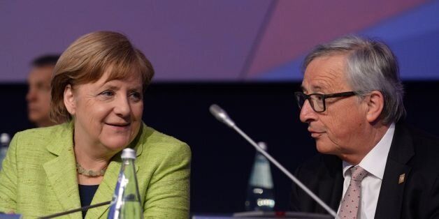 German Chancellor, Angela Merkel (L) talks with President of the European Commission Jean-Claude Juncker at the European People's party congress (EPP) on March 30, 2017 in St Julians Malta. / AFP PHOTO / Matthew Mirabelli / Malta OUT (Photo credit should read MATTHEW MIRABELLI/AFP/Getty Images)