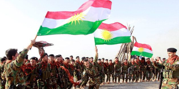Kurdish Peshmerga forces celebrate Newroz Day, a festival marking spring and the new year, in Kirkuk March 20, 2017. REUTERS/Ako Rasheed