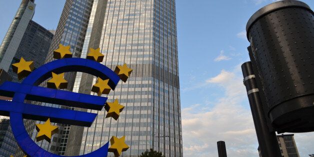 Frankfurt, Hessen, Germany â August 21, 2011: European Central Bank and Kommerz Bank buildings, Euro symbol and Trash Bin. Financial district, Frankfurt, Germany.