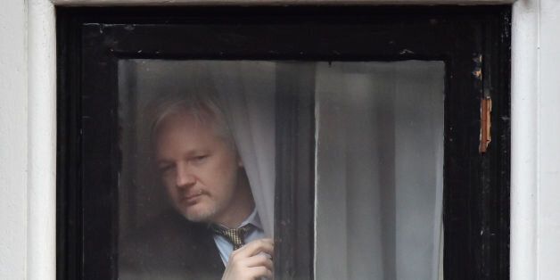 ALTERNATE CROPWikiLeaks founder Julian Assange looks out before speaking from the balcony of the Ecuadorian Embassy in London where he has been living for more than three years after the country granted him political asylum.