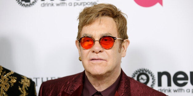 Singer Elton poses at his 70th Birthday and 50-Year Songwriting Partnership with Bernie Taupin event, benefiting the Elton John AIDS Foundation and the UCLA Hammer Museum at RED Studios Hollywood in Los Angeles, March 25, 2017. REUTERS/Danny Moloshok