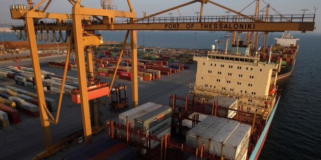 A cargo ship is docked at the commercial terminal of the port of the northern city of Thessaloniki, Greece August 4, 2016. Picture taken August 4, 2016. REUTERS/Alexandros Avramidis