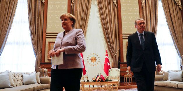 Turkish President Recep Tayyip Erdogan and German Chancellor Angela Merkel leave folloring their meeting at the presidential palace during the first visit since July's failed coup in Ankara, Turkey, February 2, 2017. REUTERS/Umit Bektas