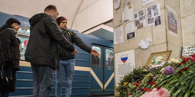 SAINT PETERSBURG, RUSSIA - APRIL 12: Members of the civic organization Avaaz show their solidarity with the citizens of St. Petersburg after the recent Metro bombing by putting up messages of condolence in the vestibule of Tekhnologichesky Institute metro station on April 12, 2017 in Saint Petersburg, Russia. On April 3, 2017 a bomb blast tore through a subway train in Russia's second largest city, killing 14 people and wounding more than 40. (Photo by Alexander Aksakov/Getty Images)
