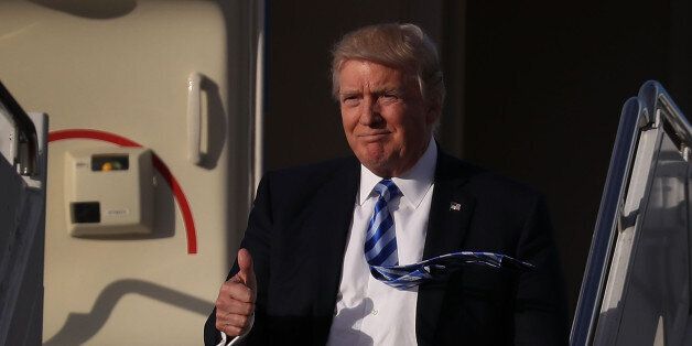 WEST PALM BEACH, FL - APRIL 13: President Donald Trump arrives on Air Force One at the Palm Beach International Airport to spend Easter weekend at Mar-a-Lago resort on April 13, 2017 in West Palm Beach, Florida. President Trump has made numerous trips to his Florida home and according to reports has cost over an estimated $20 million in his first 80 days in office. (Photo by Joe Raedle/Getty Images)