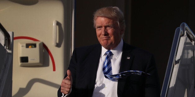 WEST PALM BEACH, FL - APRIL 13: President Donald Trump arrives on Air Force One at the Palm Beach International Airport to spend Easter weekend at Mar-a-Lago resort on April 13, 2017 in West Palm Beach, Florida. President Trump has made numerous trips to his Florida home and according to reports has cost over an estimated $20 million in his first 80 days in office. (Photo by Joe Raedle/Getty Images)