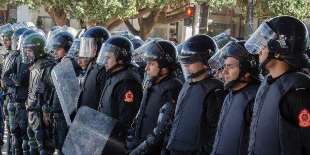 RABAT, MOROCCO - JANUARY 29: Moroccan police officers take security measures during an anti government protest at Bab El Had Square in Rabat, Morocco on January 29, 2017. (Photo by Jalal Morchidi/Anadolu Agency/Getty Images)