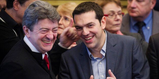 French president of the Parti de Gauche (FG) Jean-Luc Melenchon (L) and Greek head of the radical leftist Syriza party, Alexis Tsipras (R) smile as they talk during a press conference at the National Assembly in Paris on May 21 2012. Greek anti-austerity leftist leader Alexis Tsipras said today that it was not for German Chancellor Angela Merkel to call for a referendum on his debt-hit nation's membership of the eurozone. AFP PHOTO/JOEL SAGET (Photo credit should read JOEL SAGET/AFP/Gett