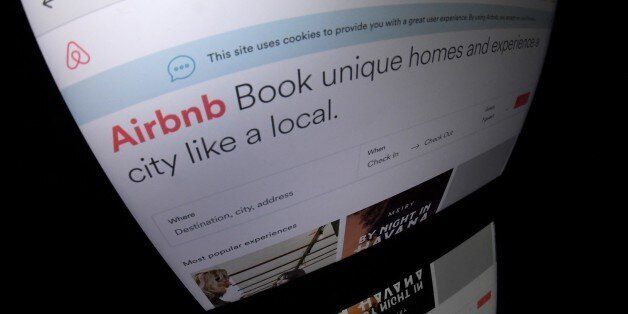 This picture taken on march 2, 2017, shows the logo of online lodging service Airbnb displayed on a computer screen in Paris. / AFP PHOTO / Lionel BONAVENTURE (Photo credit should read LIONEL BONAVENTURE/AFP/Getty Images)