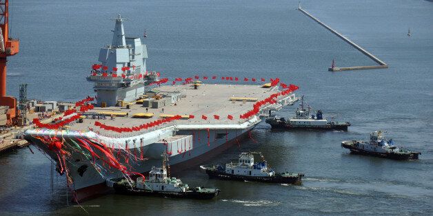 DALIAN, CHINA - APRIL 26: A launching ceremony is held for China's first domestically developed aircraft carrier at Dalian Port on April 26, 2017 in Dalian, Liaoning Province of China. China launches its second aircraft carrier which is its first homemade aircraft carrier carrying J-15 fighter jets and other aircraft on Wednesday in Dalian. (Photo by VCG/VCG via Getty Images)