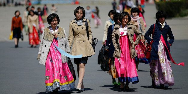 Women wear traditional clothes as North Korea prepares to mark Saturday's 105th anniversary of the birth of Kim Il-sung, North Korea's founding father and grandfather of the current ruler, in central Pyongyang, North Korea April 12, 2017. REUTERS/Damir Sagolj